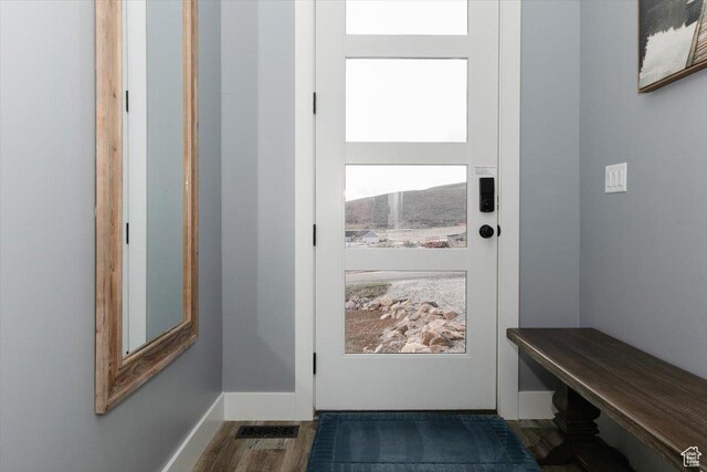 207 E Clubhouse Dr Unit 40, Garden City, UT 84028 - doorway featuring wood finished floors and baseboards
