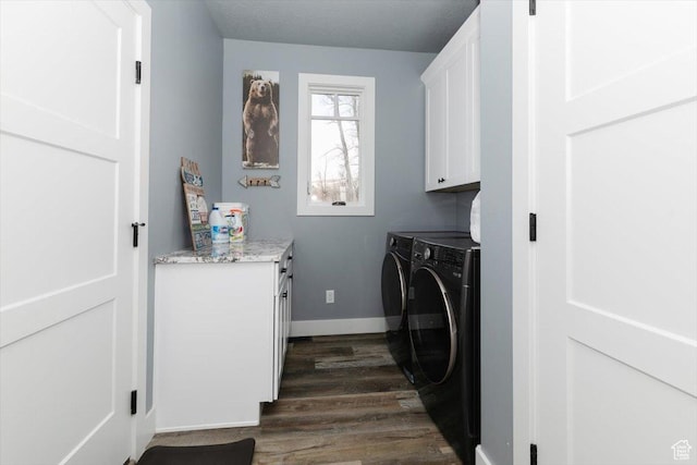 207 E Clubhouse Dr Unit 40, Garden City, UT 84028 - laundry area with cabinet space, separate washer and dryer, dark wood-style flooring, and baseboards