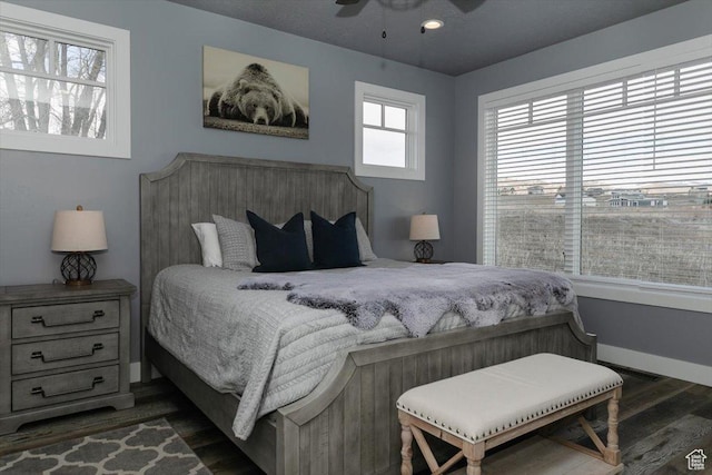 207 E Clubhouse Dr Unit 40, Garden City, UT 84028 - bedroom with wood finished floors, baseboards, and ceiling fan