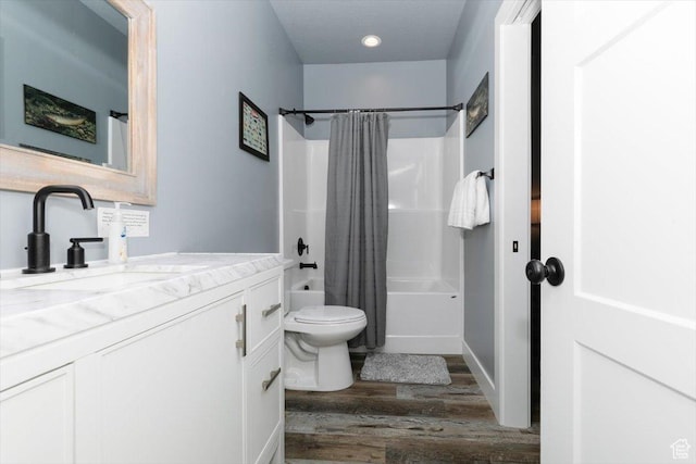 207 E Clubhouse Dr Unit 40, Garden City, UT 84028 - bathroom featuring wood finished floors, toilet, shower / tub combo with curtain, vanity, and recessed lighting
