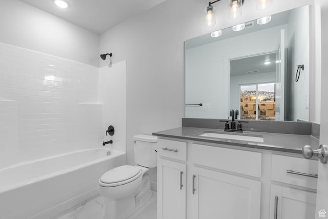 bathroom with vanity, marble finish floor, toilet, washtub / shower combination, and recessed lighting