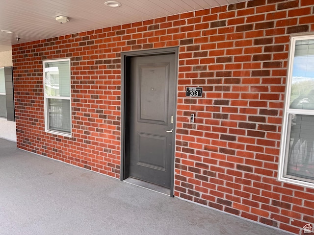 675 S 100 W Unit A203, Springville, UT 84663 - view of exterior entry featuring brick siding
