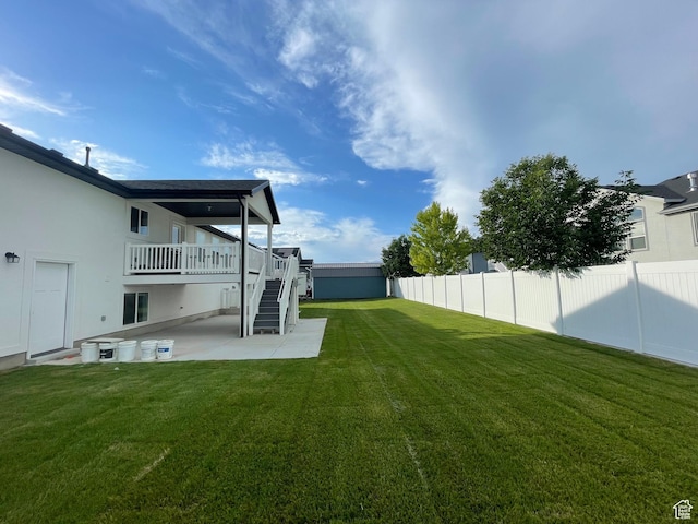 3834 N 2550 W, Farr West, UT 84404 - view of yard featuring stairway, a patio, and a wooden deck