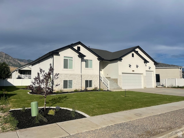 3834 N 2550 W, Farr West, UT 84404 - view of front facade featuring driveway, stucco siding, and an attached garage
