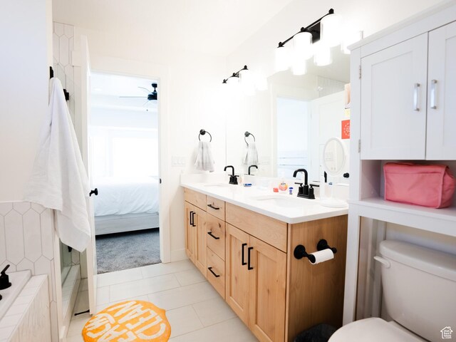 3834 N 2550 W, Farr West, UT 84404 - bathroom with double vanity, toilet, a sink, and tile patterned flooring