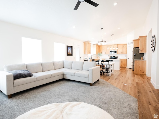 3834 N 2550 W, Farr West, UT 84404 - living area featuring light wood-type flooring, a ceiling fan, and recessed lighting