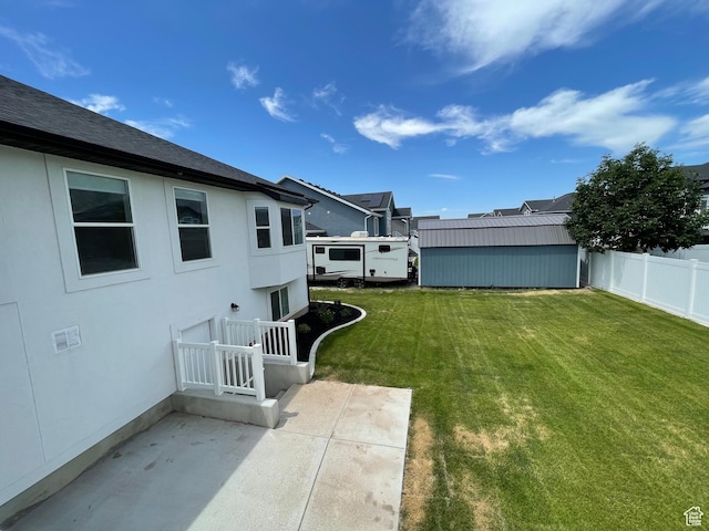3834 N 2550 W, Farr West, UT 84404 - view of yard featuring a patio area and a shed
