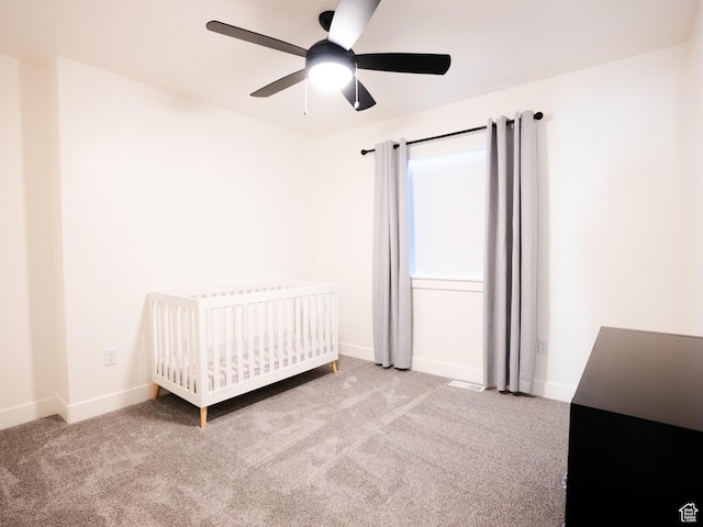 3834 N 2550 W, Farr West, UT 84404 - carpeted bedroom featuring baseboards, a ceiling fan, and a nursery area