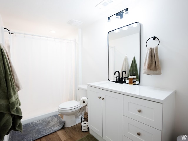 3834 N 2550 W, Farr West, UT 84404 - full bath with a shower with curtain, visible vents, wood finished floors, vanity, and toilet