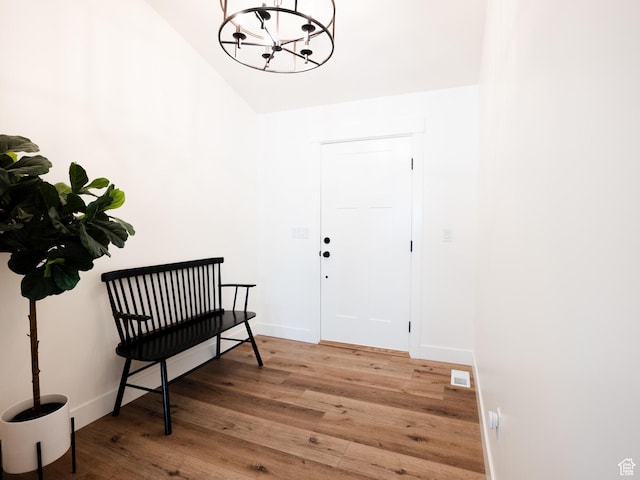 3834 N 2550 W, Farr West, UT 84404 - interior space featuring visible vents, light wood-type flooring, baseboards, high vaulted ceiling, and a chandelier