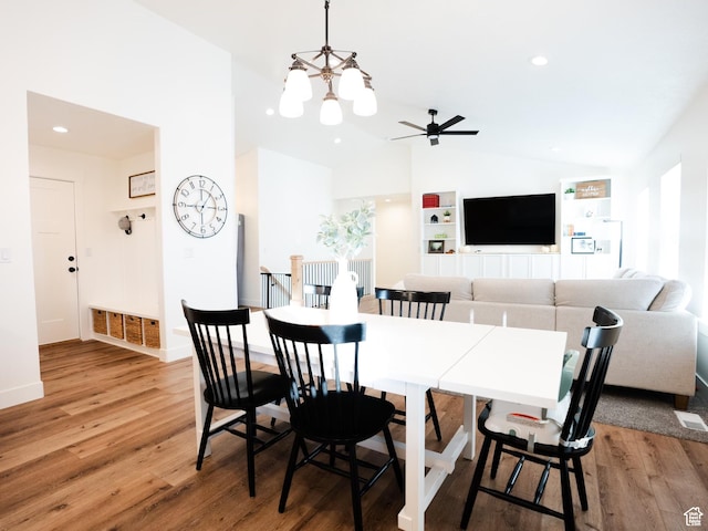 3834 N 2550 W, Farr West, UT 84404 - dining area with light wood-style floors, recessed lighting, ceiling fan with notable chandelier, and high vaulted ceiling