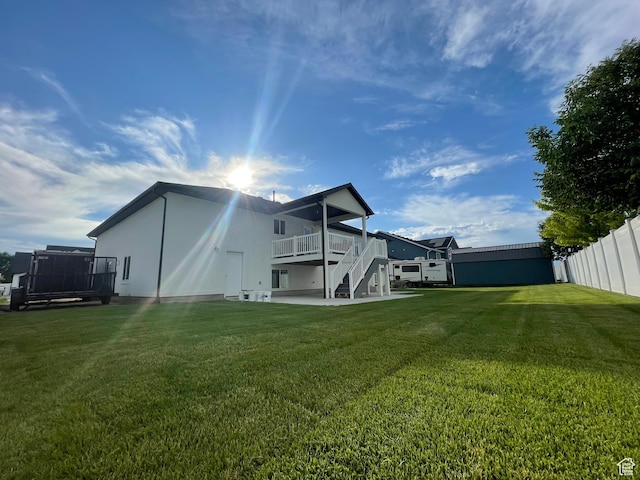 3834 N 2550 W, Farr West, UT 84404 - back of house with stairs and a wooden deck