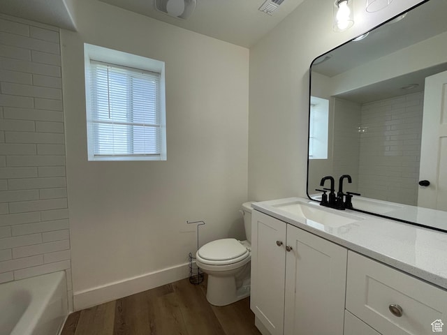 3834 N 2550 W, Farr West, UT 84404 - full bathroom with vanity, wood finished floors, and washtub / shower combination