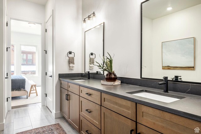 359 N Abajo Peak Loop E Unit A3, Heber City, UT 84032 - bathroom featuring a sink, ensuite bath, and double vanity