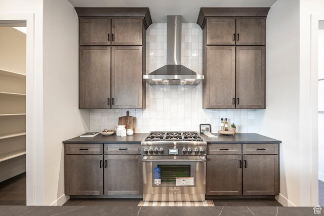 359 N Abajo Peak Loop E Unit A3, Heber City, UT 84032 - kitchen featuring high end range, dark countertops, decorative backsplash, and wall chimney exhaust hood