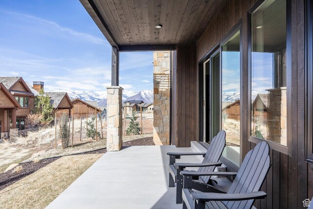 359 N Abajo Peak Loop E Unit A3, Heber City, UT 84032 - view of patio featuring fence and a mountain view