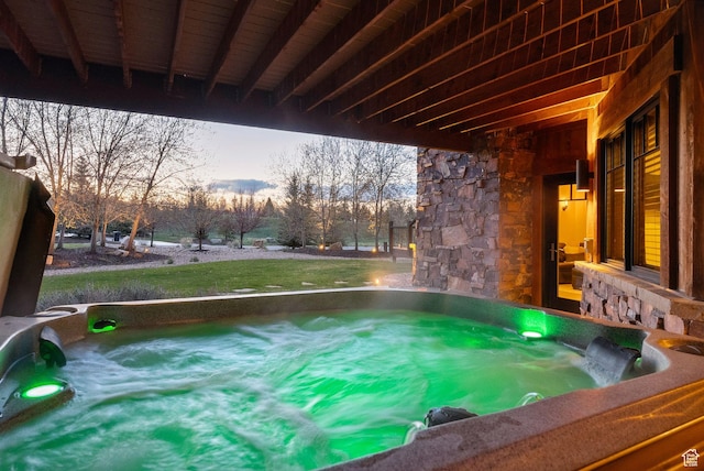 2042 Paddington Dr, Park City, UT 84060 - pool at dusk with a hot tub