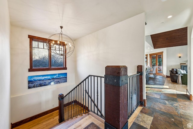 2042 Paddington Dr, Park City, UT 84060 - staircase featuring baseboards, recessed lighting, a notable chandelier, and stone tile floors
