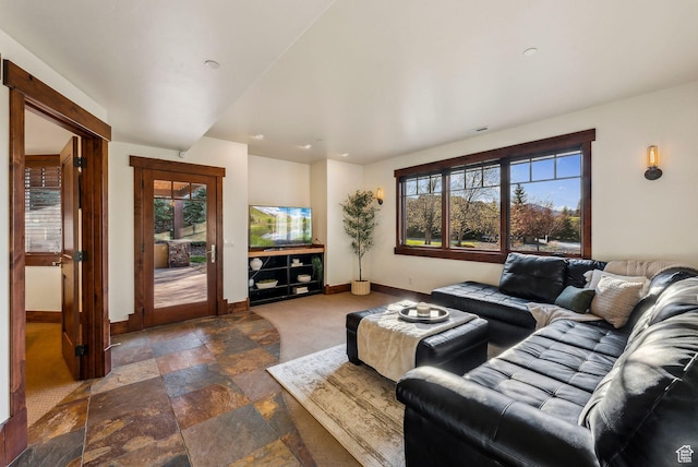 2042 Paddington Dr, Park City, UT 84060 - living room featuring baseboards and stone tile flooring
