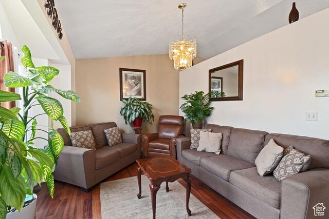 3184 W 5025 S, Roy, UT 84067 - living area with lofted ceiling, wood finished floors, and a notable chandelier