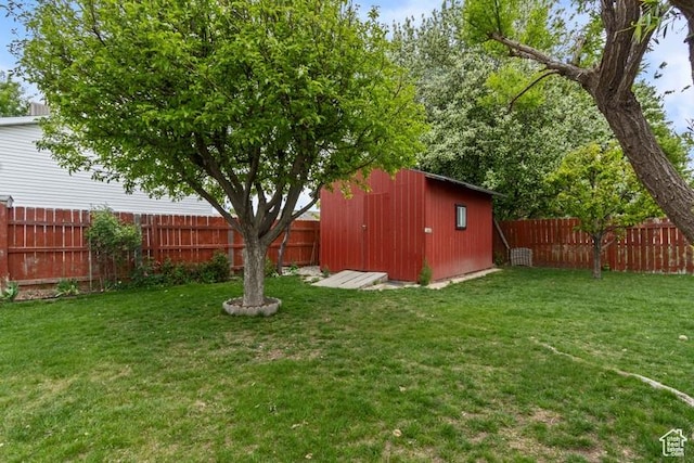 3184 W 5025 S, Roy, UT 84067 - view of yard featuring an outdoor structure, a fenced backyard, and a shed