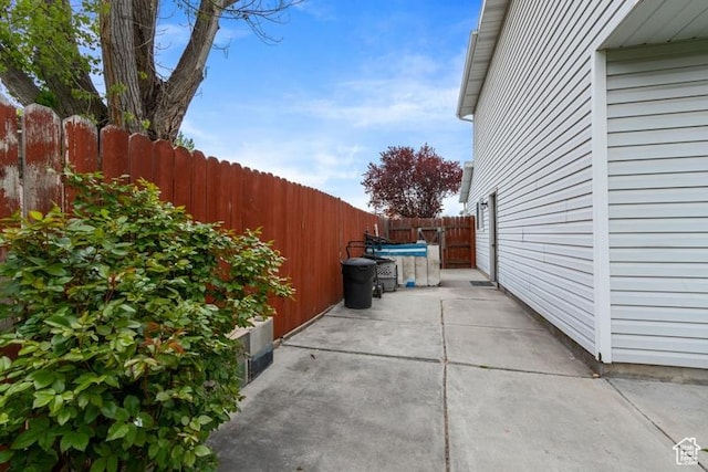 3184 W 5025 S, Roy, UT 84067 - view of side of property featuring a patio area and fence