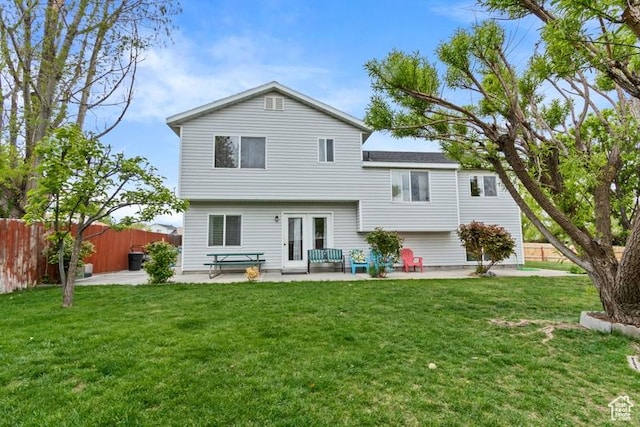 3184 W 5025 S, Roy, UT 84067 - rear view of house featuring a yard, a patio, and fence