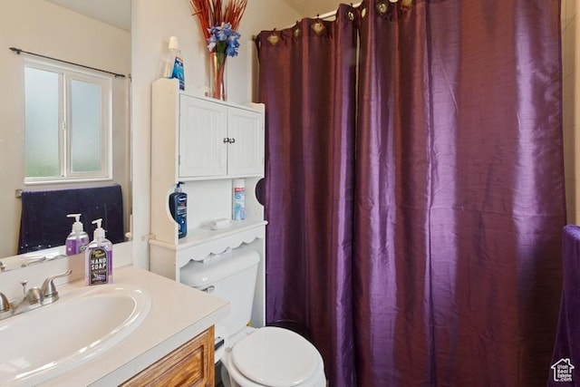 3184 W 5025 S, Roy, UT 84067 - bathroom with vanity, toilet, and curtained shower