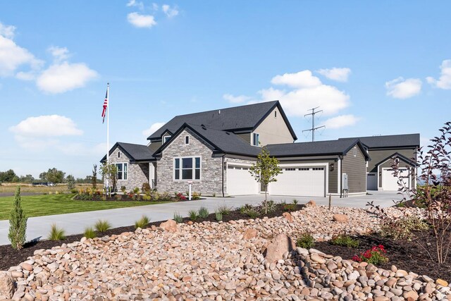 1478 W 400 N, West Bountiful, UT 84087 - view of front of home with concrete driveway, stone siding, and a garage