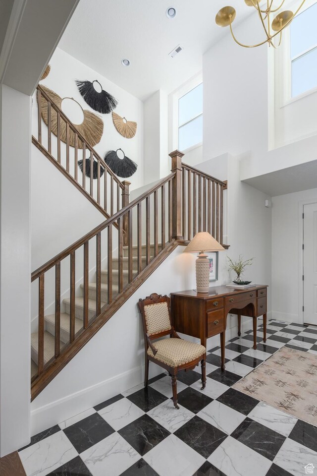 1478 W 400 N, West Bountiful, UT 84087 - stairs featuring a towering ceiling, visible vents, baseboards, and a wealth of natural light