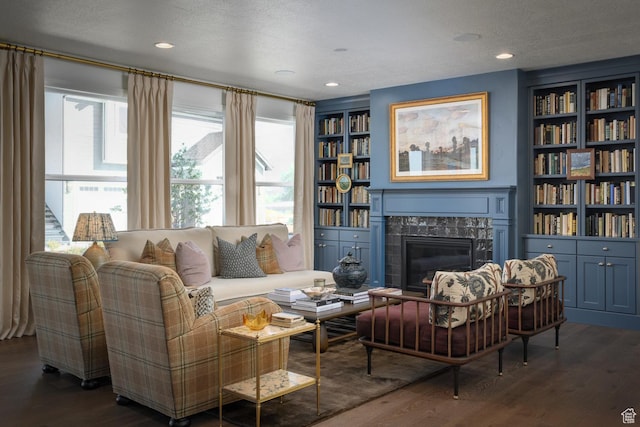1478 W 400 N, West Bountiful, UT 84087 - sitting room with a premium fireplace, built in features, and wood finished floors