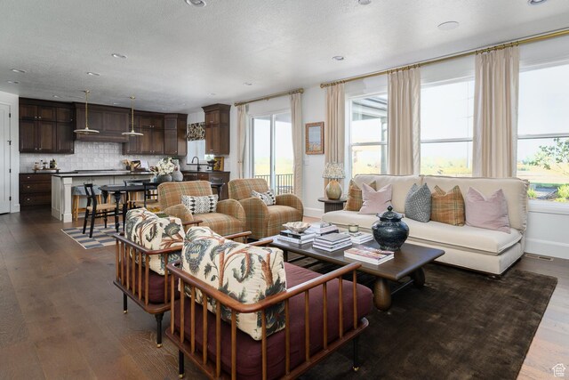 1478 W 400 N, West Bountiful, UT 84087 - living room featuring recessed lighting, baseboards, and dark wood-style flooring