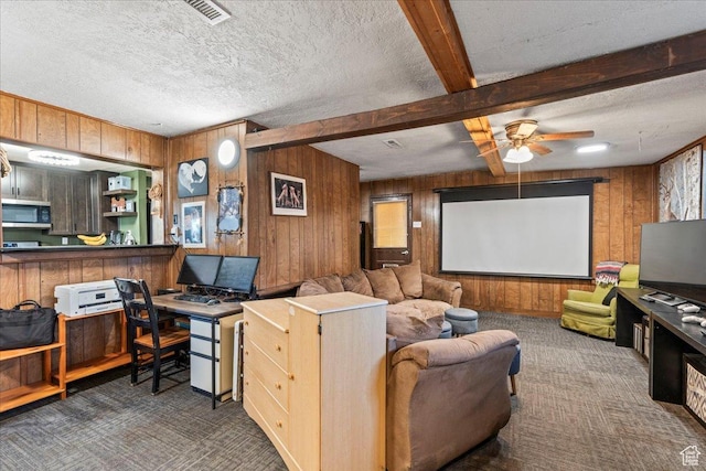 5166 S 4660 W, Salt Lake City, UT 84118 - carpeted home theater room featuring a ceiling fan, wooden walls, beamed ceiling, and a textured ceiling