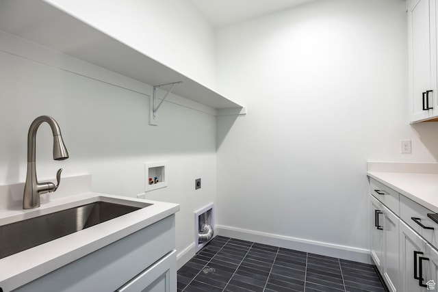 5081 W Sequoia Cir, Highland, UT 84003 - laundry area with washer hookup, hookup for an electric dryer, cabinet space, a sink, and baseboards