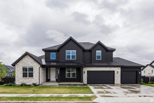 5081 W Sequoia Cir, Highland, UT 84003 - view of front of home featuring covered porch, driveway, a front lawn, a shingled roof, and stone siding
