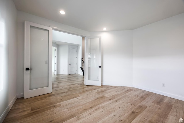 5081 W Sequoia Cir, Highland, UT 84003 - empty room featuring light wood-type flooring, recessed lighting, and baseboards