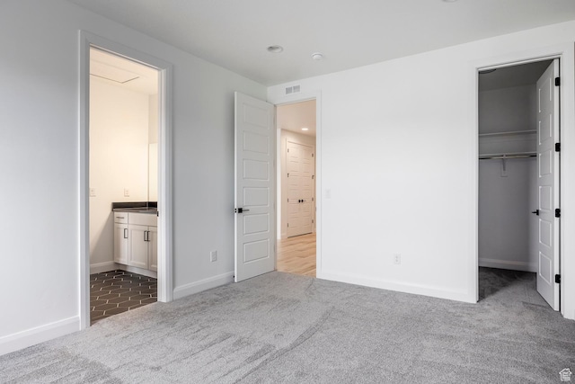 5081 W Sequoia Cir, Highland, UT 84003 - unfurnished bedroom with a walk in closet, visible vents, baseboards, carpet, and recessed lighting