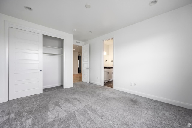 5081 W Sequoia Cir, Highland, UT 84003 - unfurnished bedroom featuring carpet floors, baseboards, ensuite bathroom, visible vents, and a closet