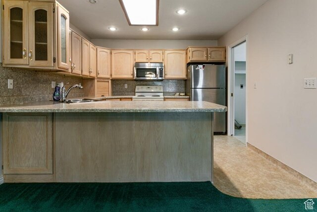 954 E 5650 S, South Ogden, UT 84405 - kitchen featuring a peninsula, light brown cabinets, glass insert cabinets, a sink, and stainless steel appliances