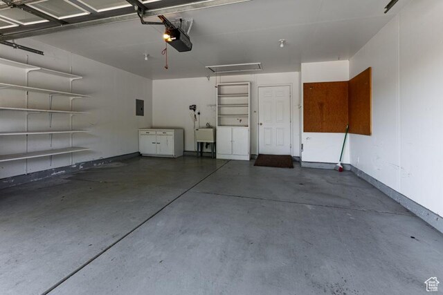 954 E 5650 S, South Ogden, UT 84405 - garage featuring a sink and a garage door opener