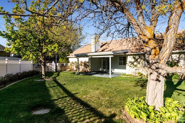 954 E 5650 S, South Ogden, UT 84405 - view of yard featuring fence and a patio area