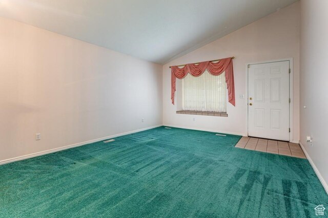 954 E 5650 S, South Ogden, UT 84405 - spare room featuring vaulted ceiling, baseboards, and carpet flooring