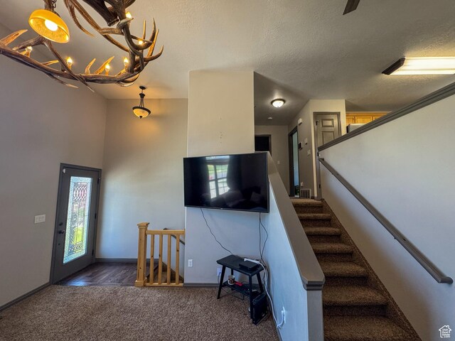 3261 S 1500 W, Nibley, UT 84321 - stairway featuring carpet floors, a textured ceiling, and baseboards