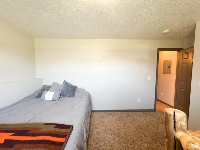 3261 S 1500 W, Nibley, UT 84321 - bedroom with carpet floors, a textured ceiling, baseboards, and electric panel