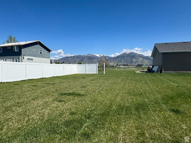 3261 S 1500 W, Nibley, UT 84321 - view of yard with a mountain view and fence