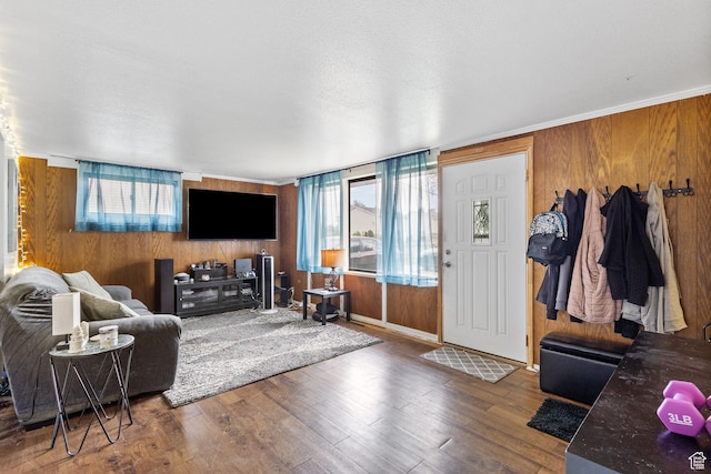 472 E Marva Ave, Layton, UT 84041 - living room featuring wooden walls, healthy amount of natural light, wood finished floors, and baseboards