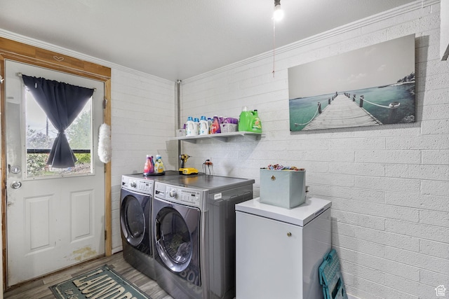 472 E Marva Ave, Layton, UT 84041 - clothes washing area with washing machine and dryer, wood finished floors, and ornamental molding