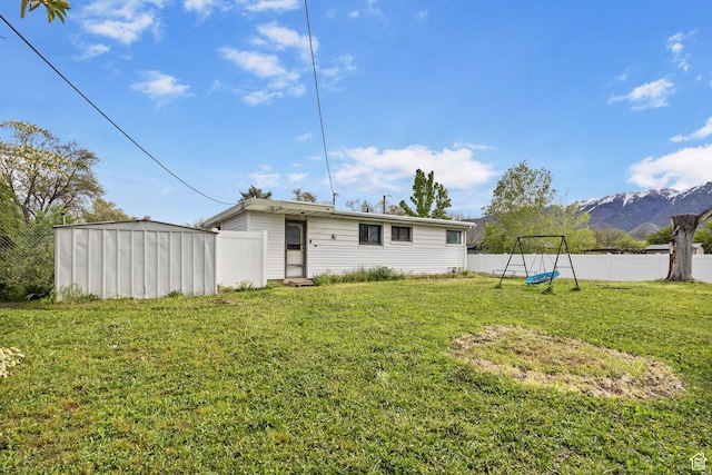 472 E Marva Ave, Layton, UT 84041 - rear view of house featuring a mountain view