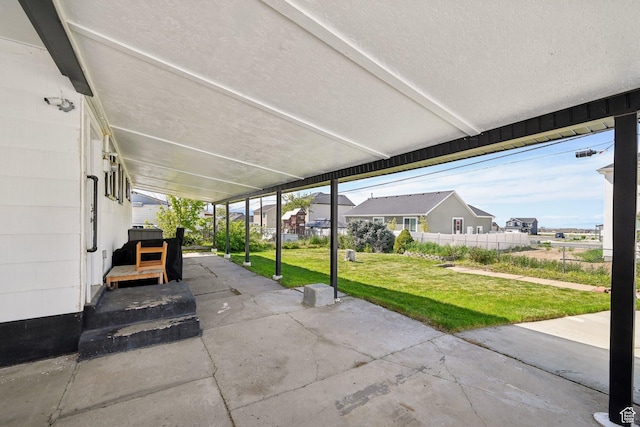 293 E Valley View Dr, Tooele, UT 84074 - view of patio with fence and a residential view