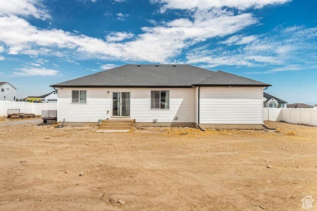 197 W Phelps St S, Grantsville, UT 84029 - rear view of property featuring fence